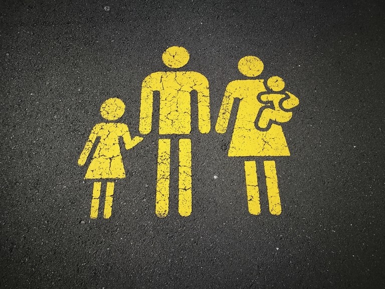 Familien-Icon auf Straße